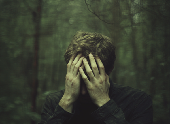 jfendy_a_man_is_stress_and_cover_his_face_with_both_of_his_ha_0ddadb95-eff4-4ab3-bd75-4348818462e8_0